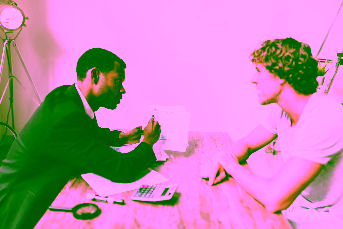 Financial paperwork being reviewed at a desk